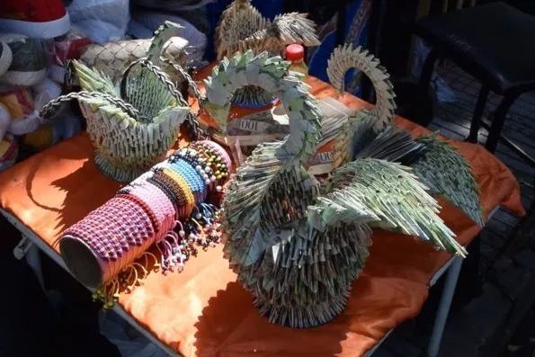 Venezuela's currency is severely devalued, and people use cash to make handicrafts